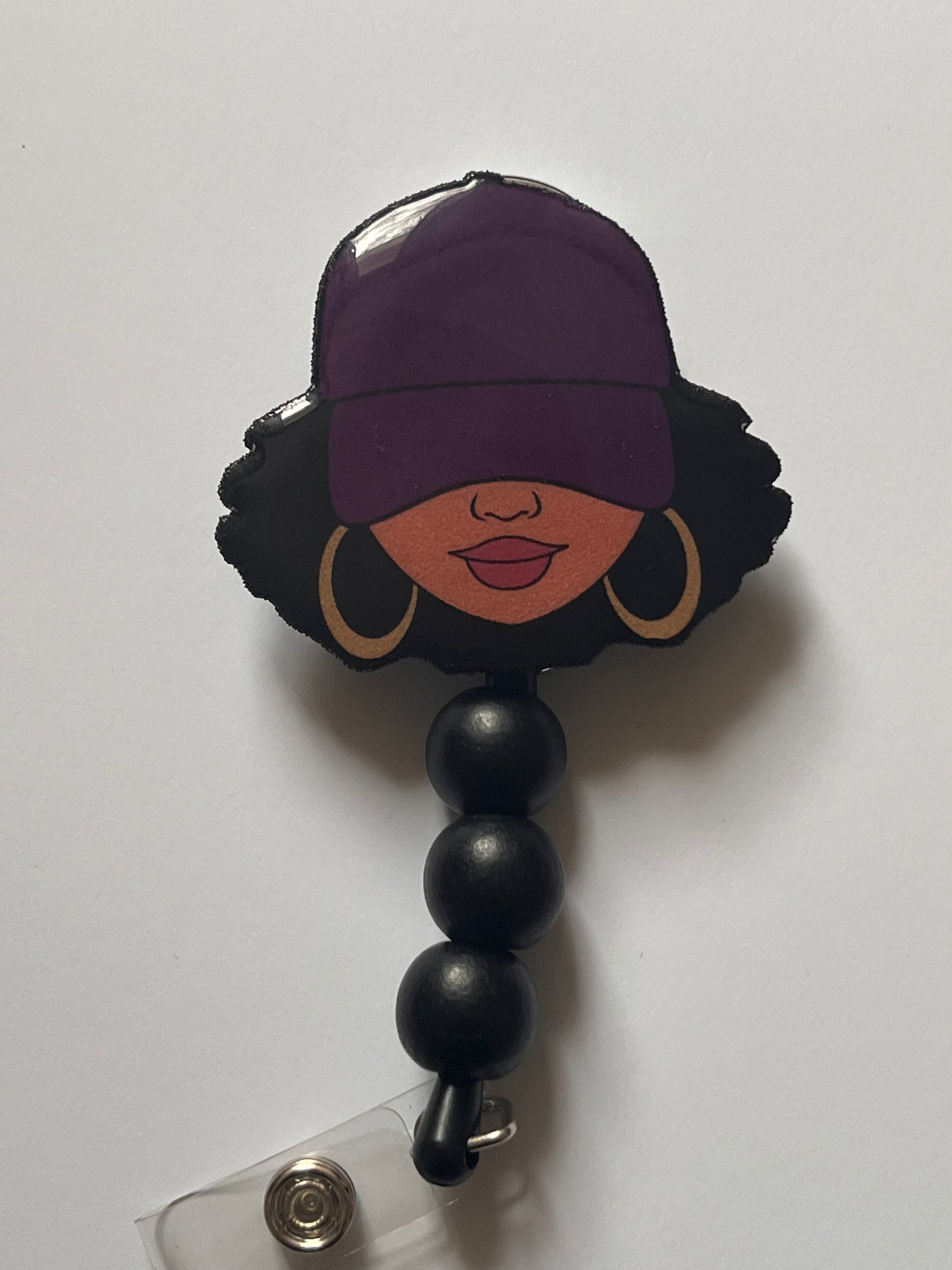 Woman badge reel